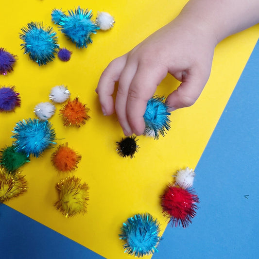 POMPONS GLITTER